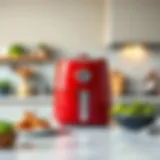 Elegant red air fryer on a modern kitchen counter