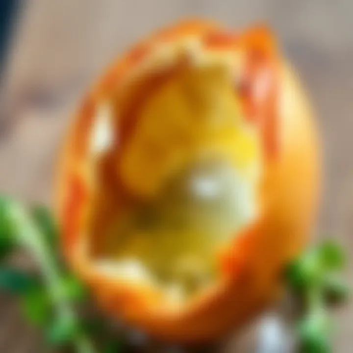 A close-up of a quail egg cracked open