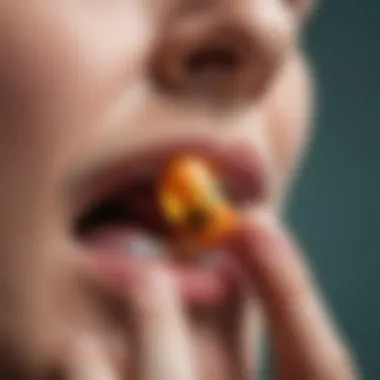 Close-up of a person holding a vitamin capsule